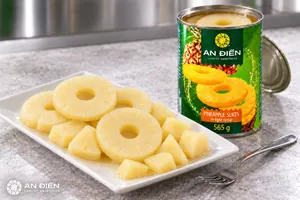 Machine-cut pineapple slices on a serving tray